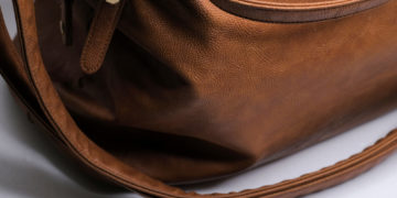 How to get rid of grease stains from leather purse?